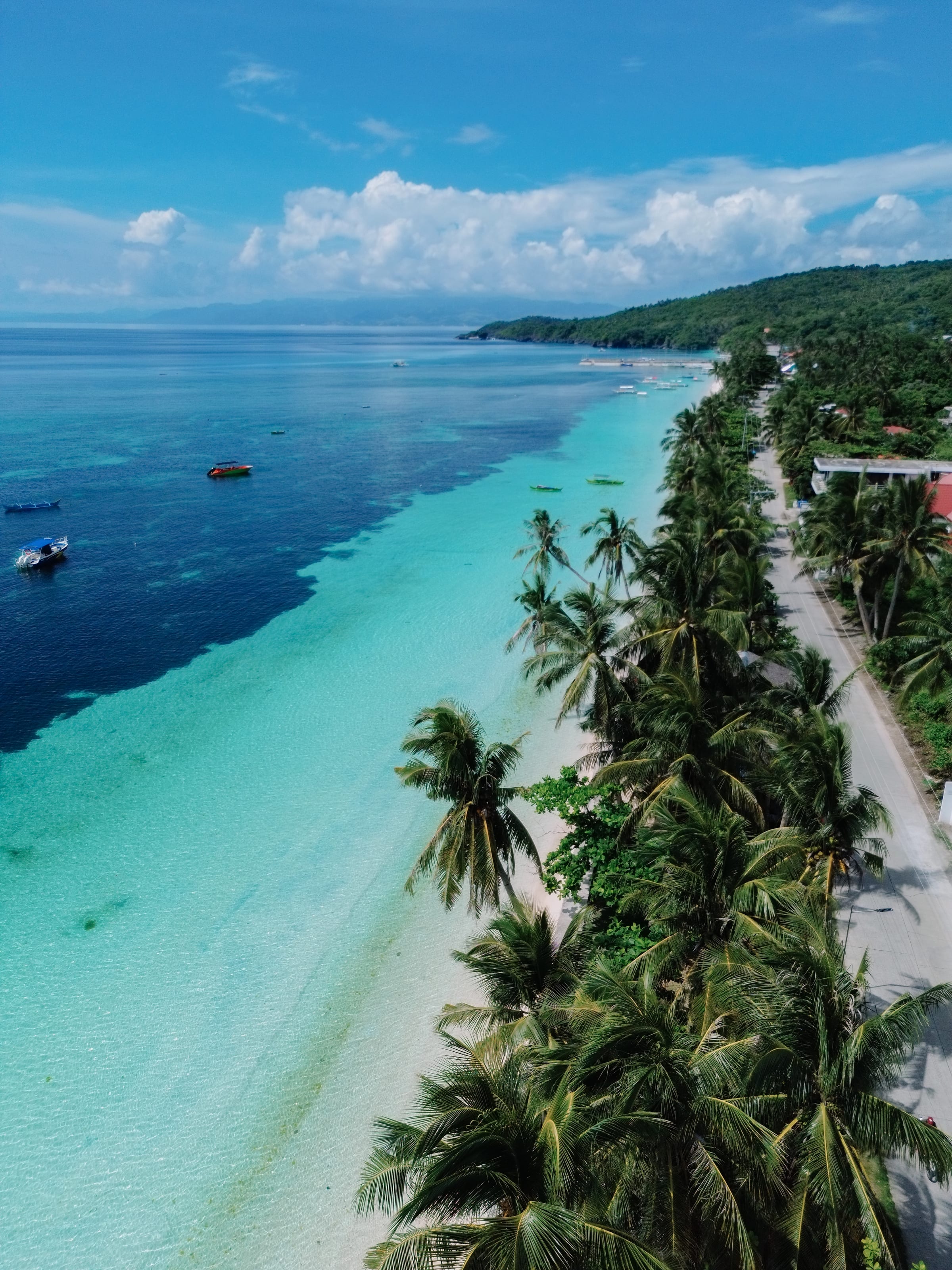 Aerial view of white sand and turquoise water in Romblon